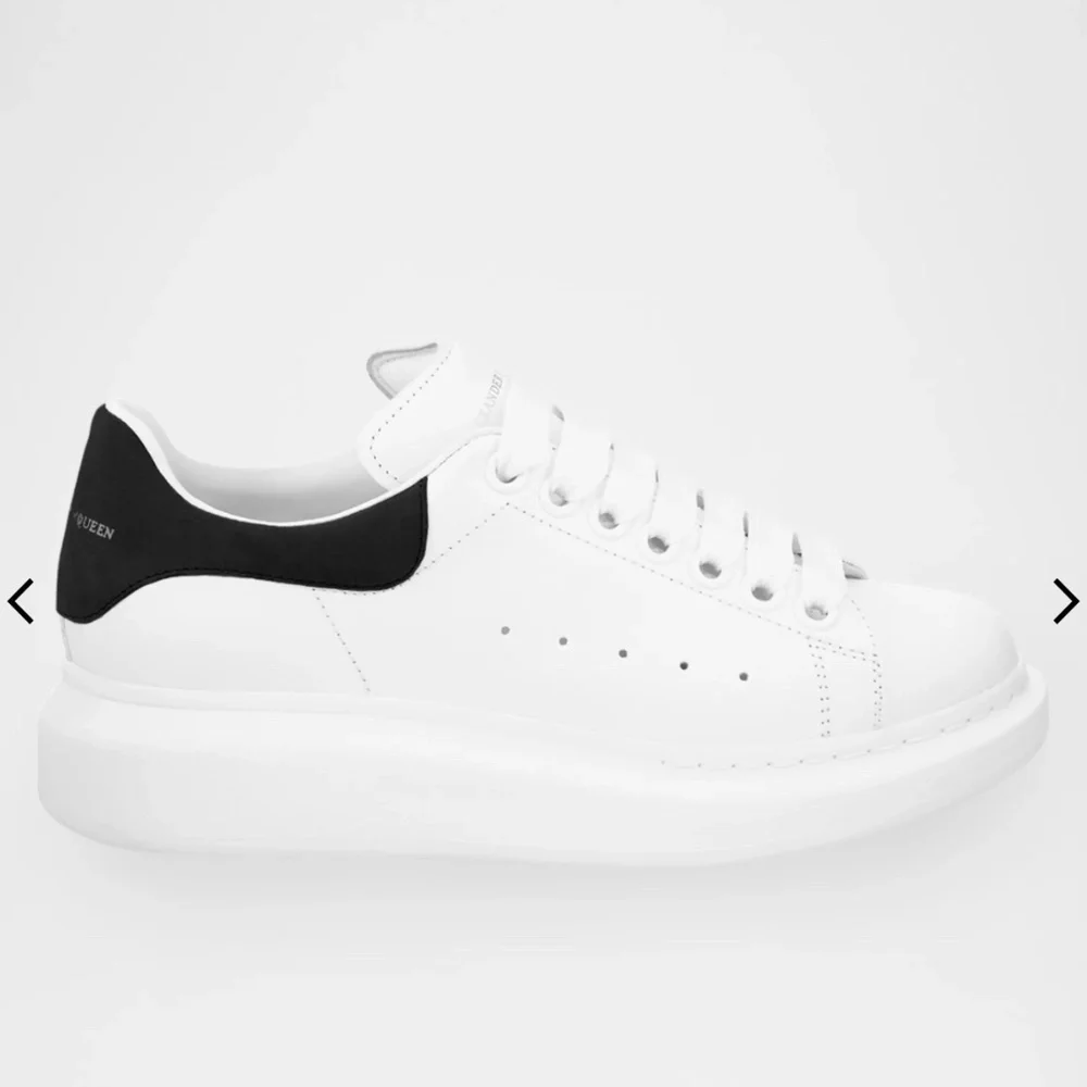 Alexander McQueen White Leather Sneakers with Black Heel Tab